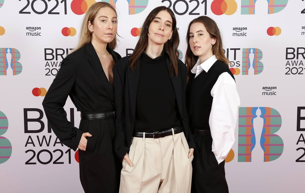 Este Haim, Danielle Haim,and Alana Haim of Haim pose in the media room during The BRIT Awards 2021 at The O2 Arena on May 11, 2021 in London, England. (Photo by JMEnternational/JMEnternational for BRIT Awards/Getty Images)