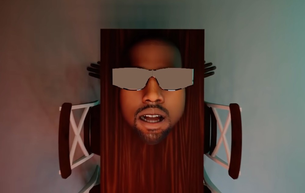 Kanye West as a table in the second video for 'Eazy'. Source: YouTube