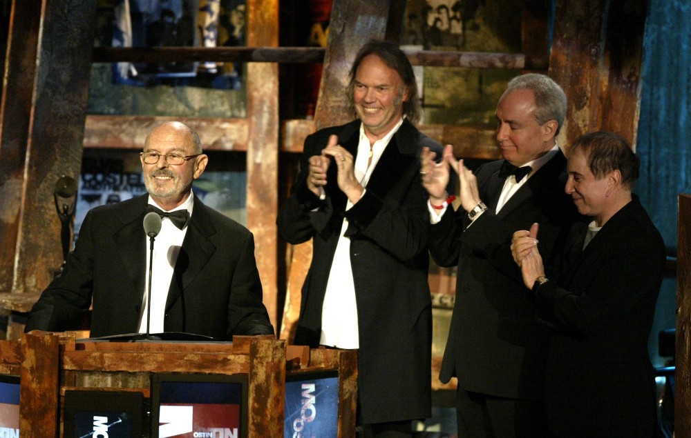 Mo Ostin being inducted into the Rock and Roll Hall of Fame in 2003, where he was honoured by Neil Young, Lorne Michaels and Paul Simon