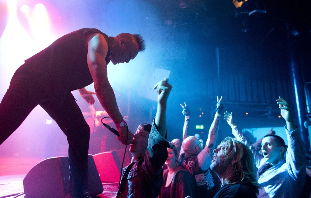 John Robb performs on stage with Goldblade at the Punk Rebellion festival, Melkweg, Amsterdam, Netherland (Photo by Paul Bergen/Redferns)