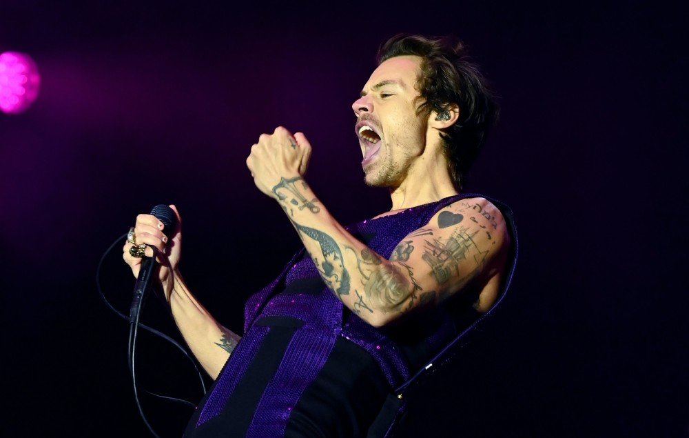 Harry Styles performing live on-stage in May 2022