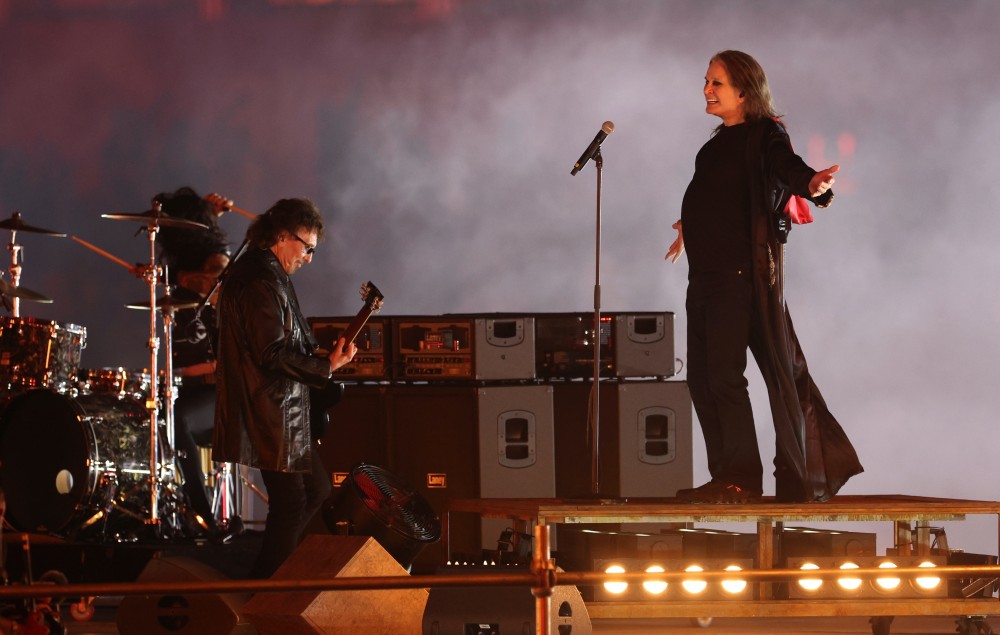 Tony Iommi and Ozzy Osbourne of Black Sabbath performing together at the Commonwealth Games closing ceremony at the Alexander Stadium in Birmingham