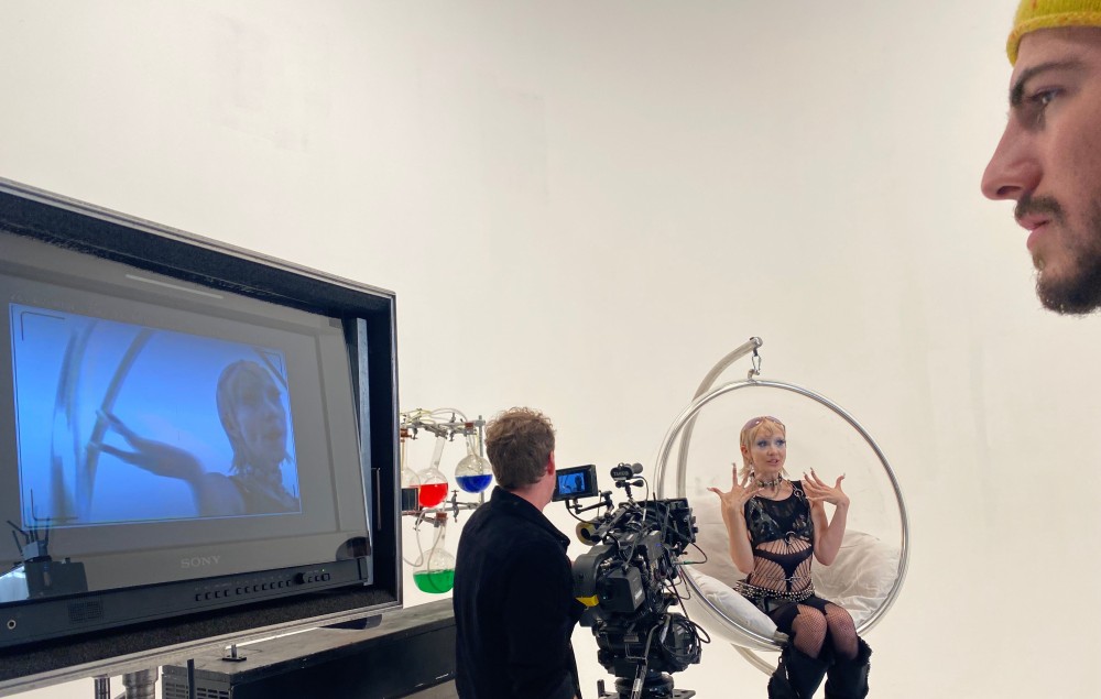 Behind-the-scenes image from Chloe Moriondo's 'Plastic Purse' video shoot