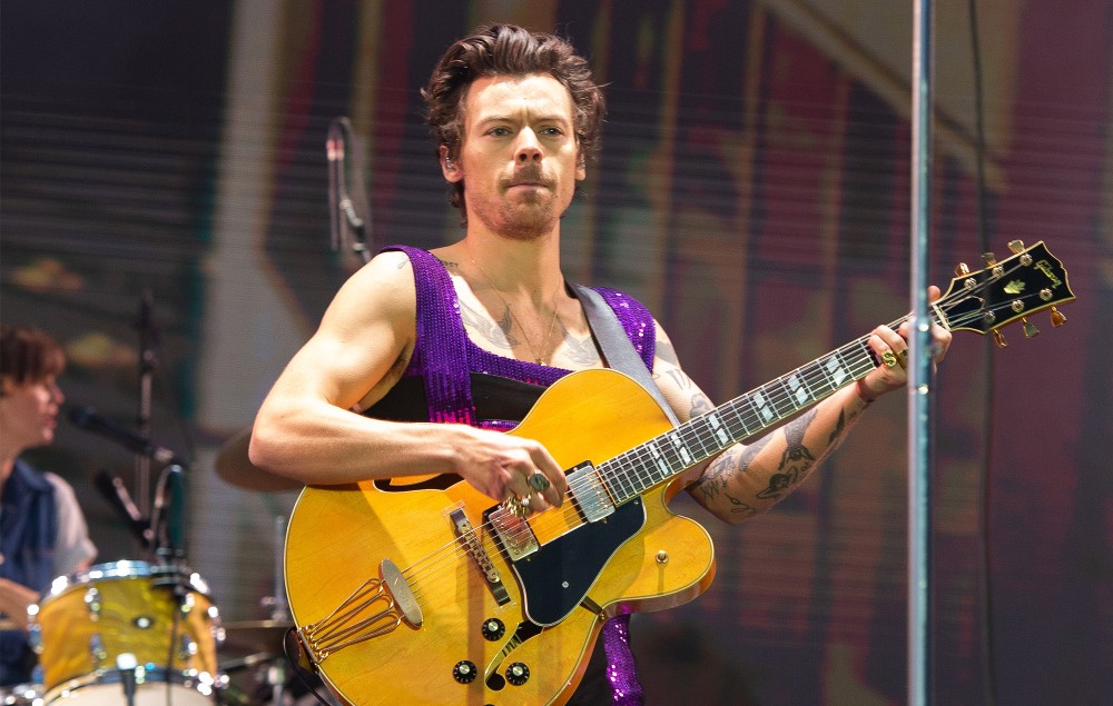 Harry Styles performing live on-stage