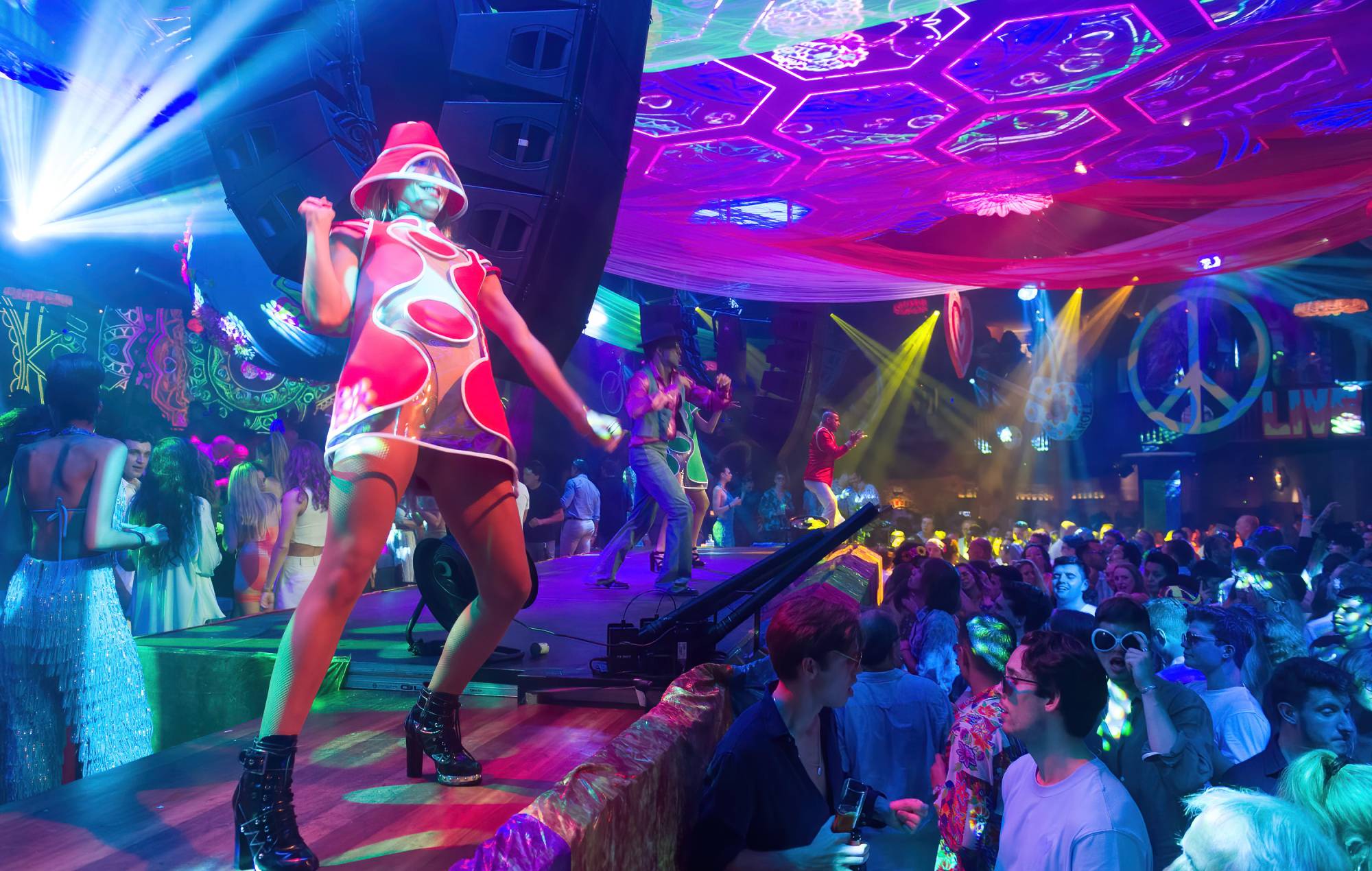 A dancer at the Flower Power party at Pacha Ibiza nightclub, on June 7, 2022. Credit: German Lama/ GETTY