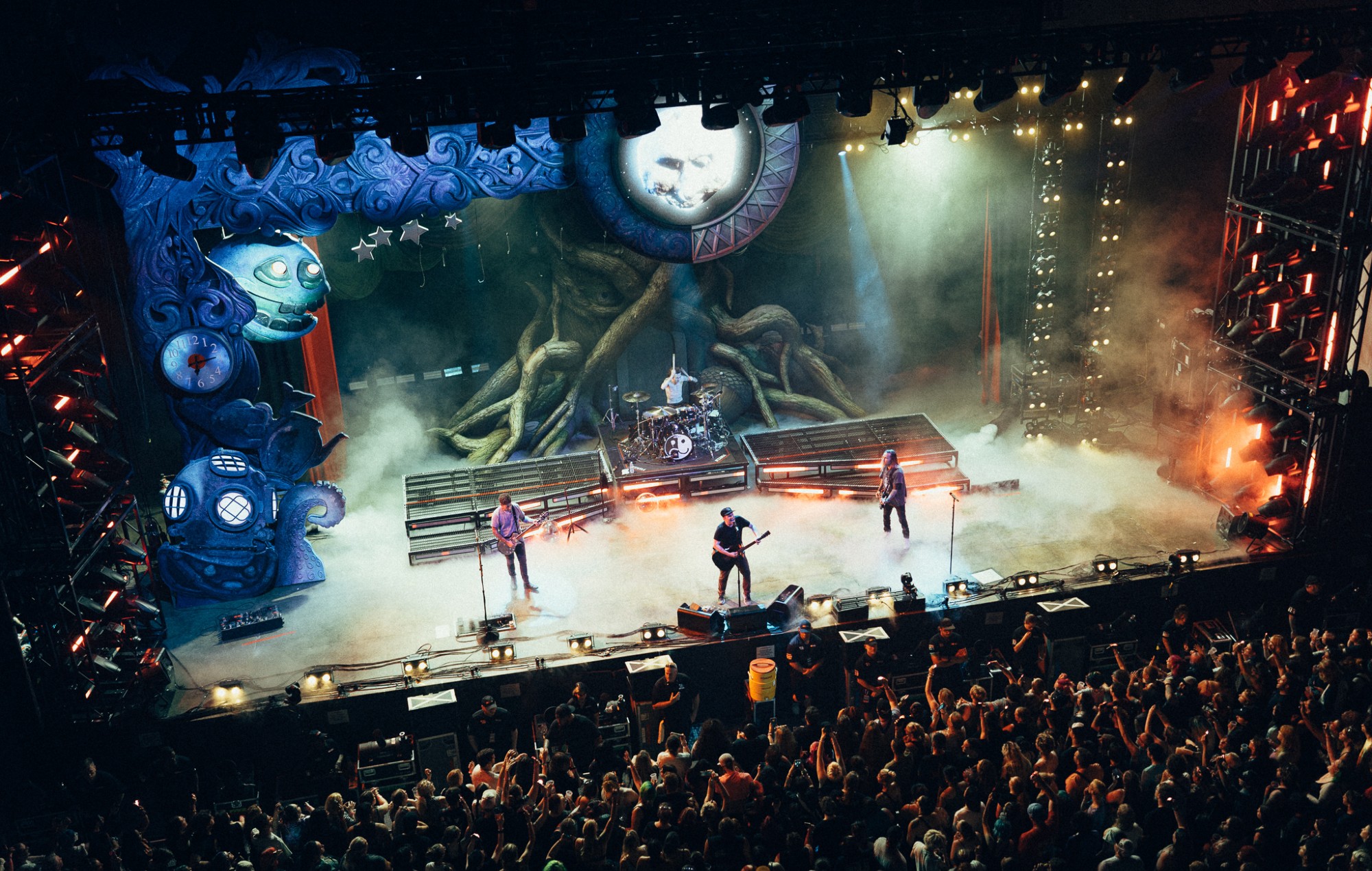 Patrick Stump, Pete Wentz, Andy Hurley, and Joe Trohman of Fall Out Boy perform live