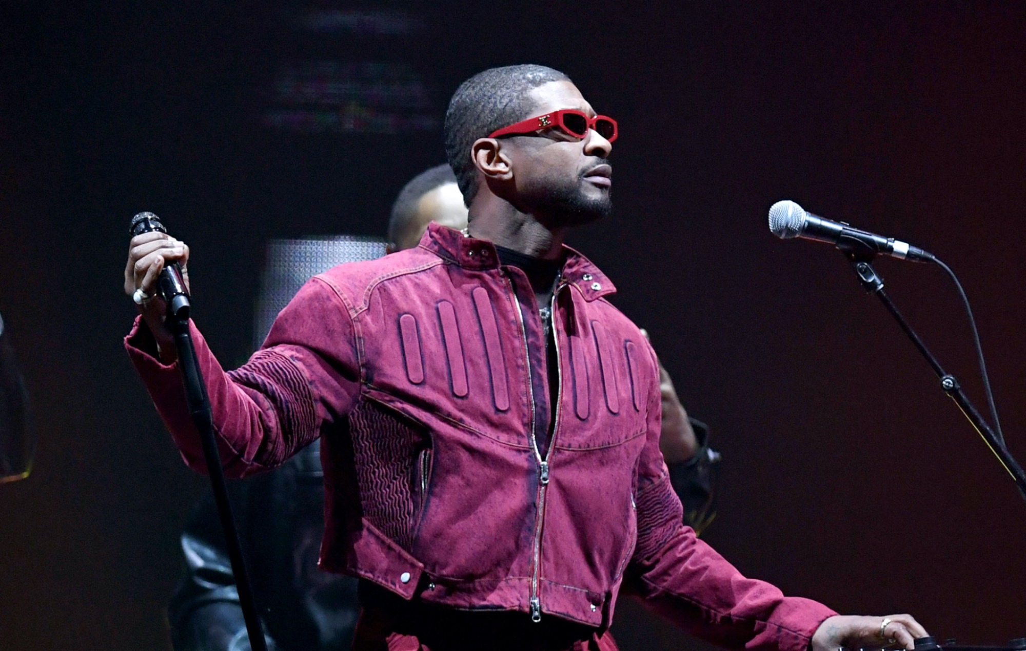 Usher performing live on stage
