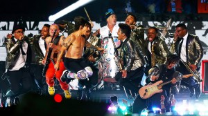 EAST RUTHERFORD, NJ - FEBRUARY 02: Bruno Mars and the Red Hot Chili Peppers performB during the Pepsi Super Bowl XLVIII Halftime Show at MetLife Stadium on February 2, 2014 in East Rutherford, New Jersey.  (Photo by Elsa/Getty Images)