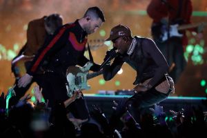 Adam Levine of Maroon 5, left, and Travis Scott perform during halftime of the NFL Super Bowl 53 football game between the Los Angeles Rams and the New England Patriots, in AtlantaPatriots Rams Super Bowl Football, Atlanta, USA - 03 Feb 2019