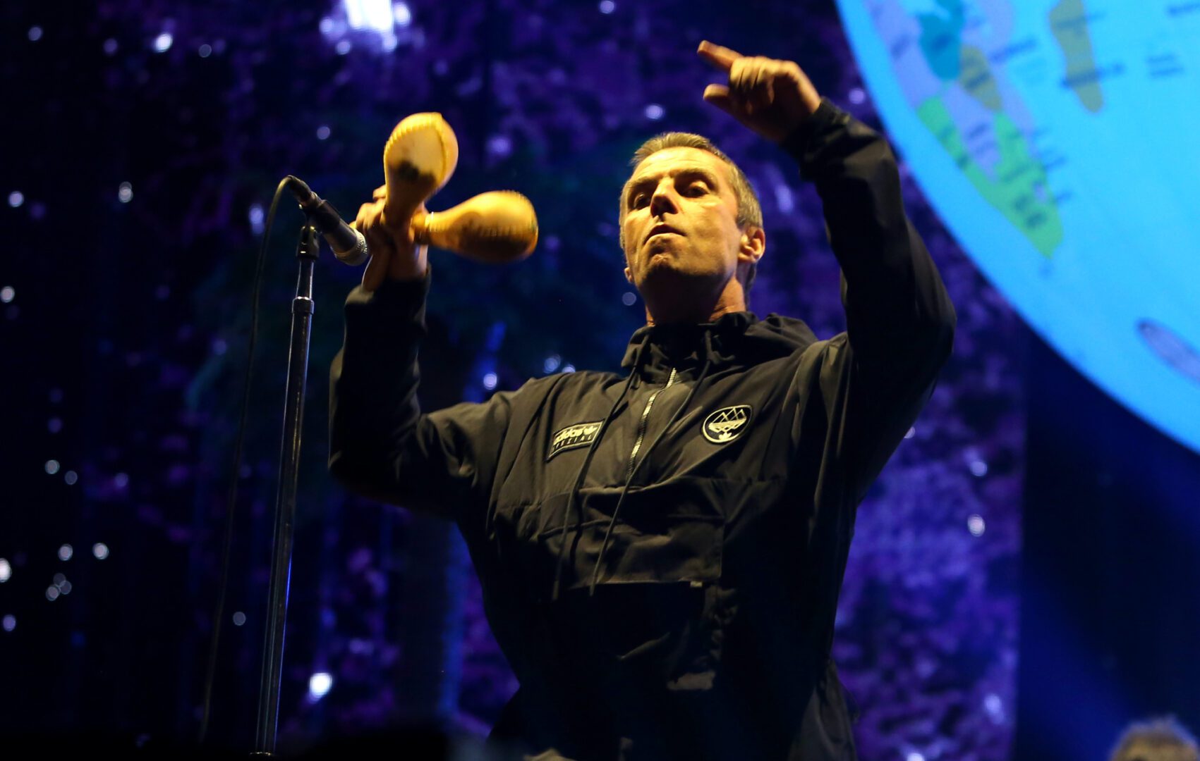 Liam Gallagher performing live on stage