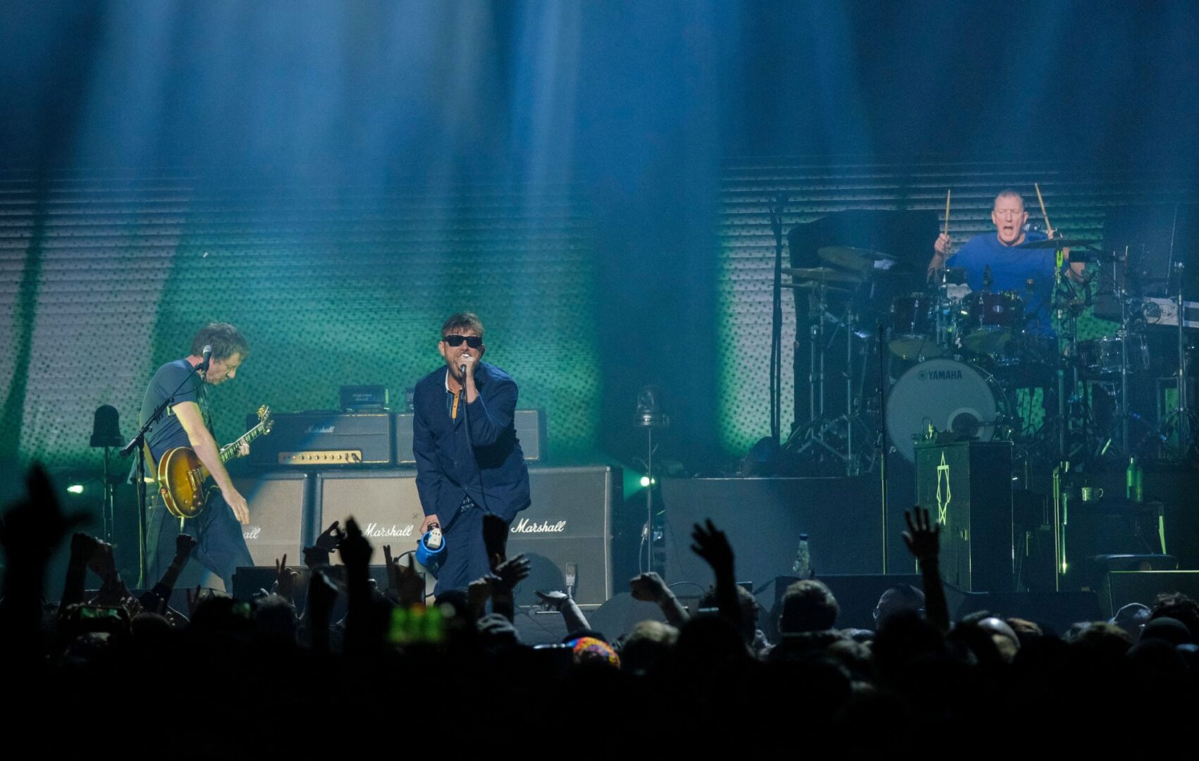 Graham Coxon, Damon Albarn and Dave Rowntree perform with Blur