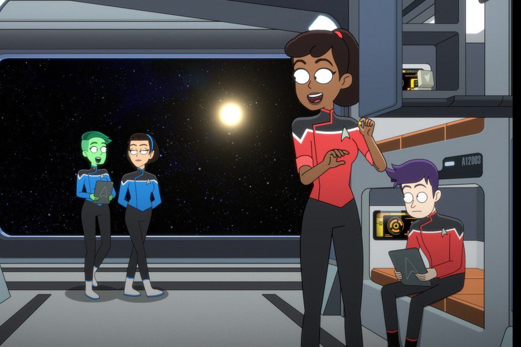 L-R Noel Wells as Ensign Tendi, Gabrielle Ruiz as TíLyn, Tawny Newsome as Ensign Beckett Mariner and Jack Quaid as Ensign Brad Boimler appearing in episode 1, season 4 of 'Star Trek: Lower Decks.'