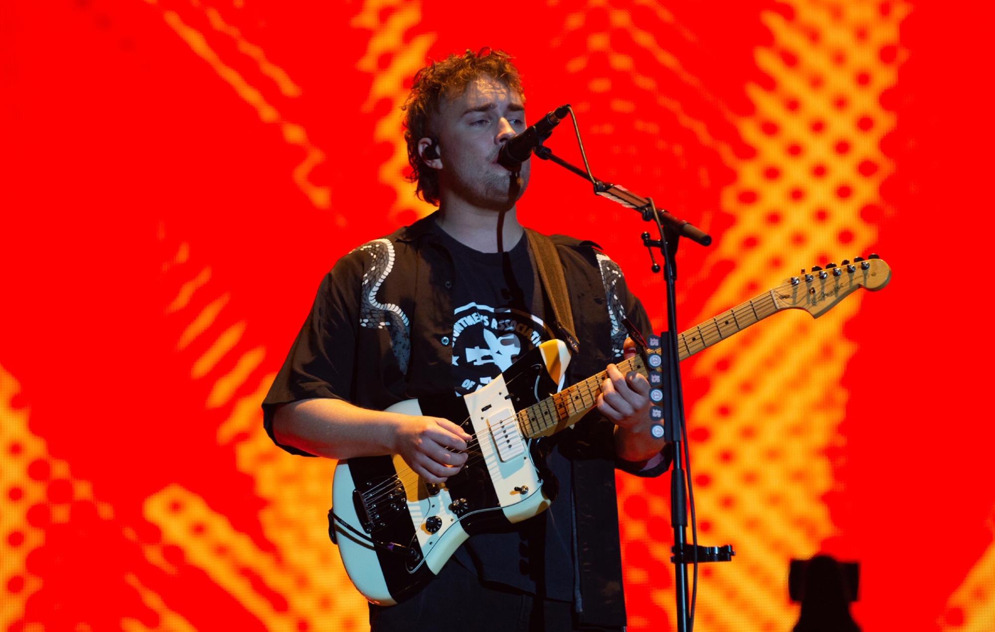 Sam Fender performing live on stage