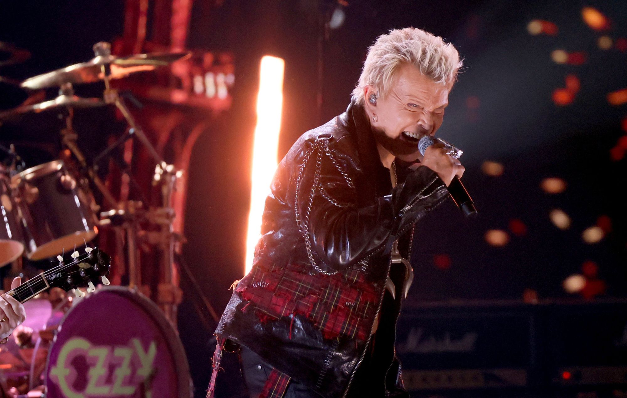 Billy Idol performs on stage in 2024.