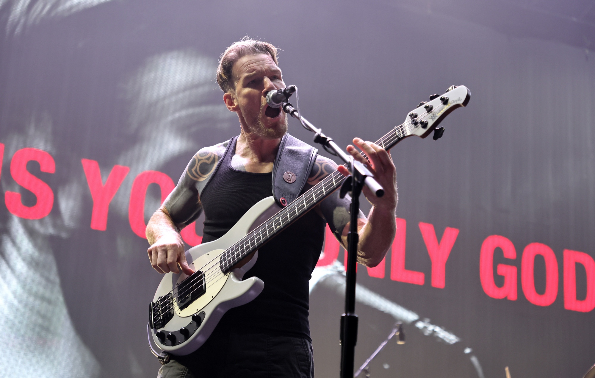 Tim Commerford of Rage Against The Machine performing live on stage