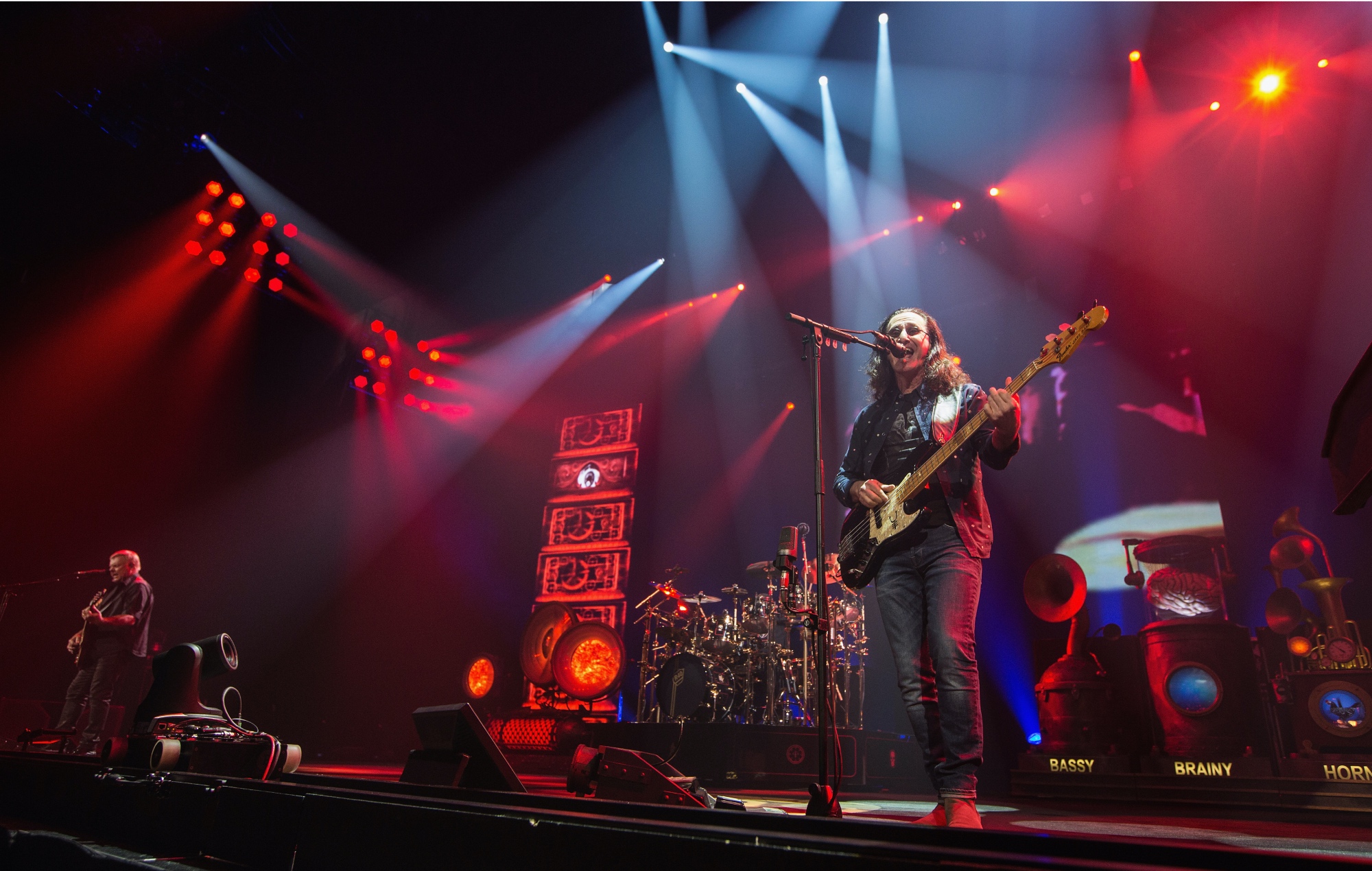 Rush performing live on stage in 2015