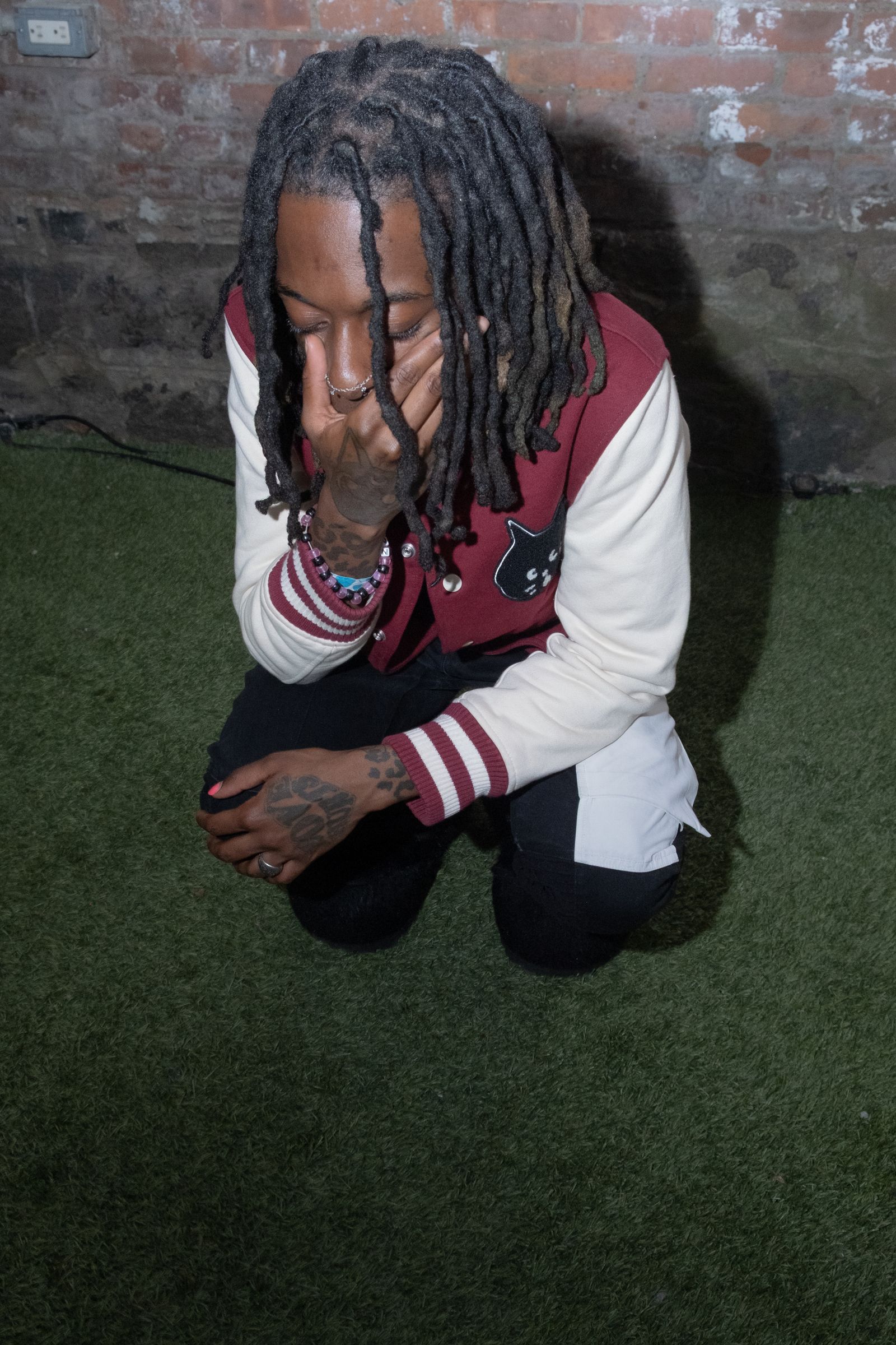 Image may contain Lil Wayne Person Accessories Jewelry Ring Braid and Hair