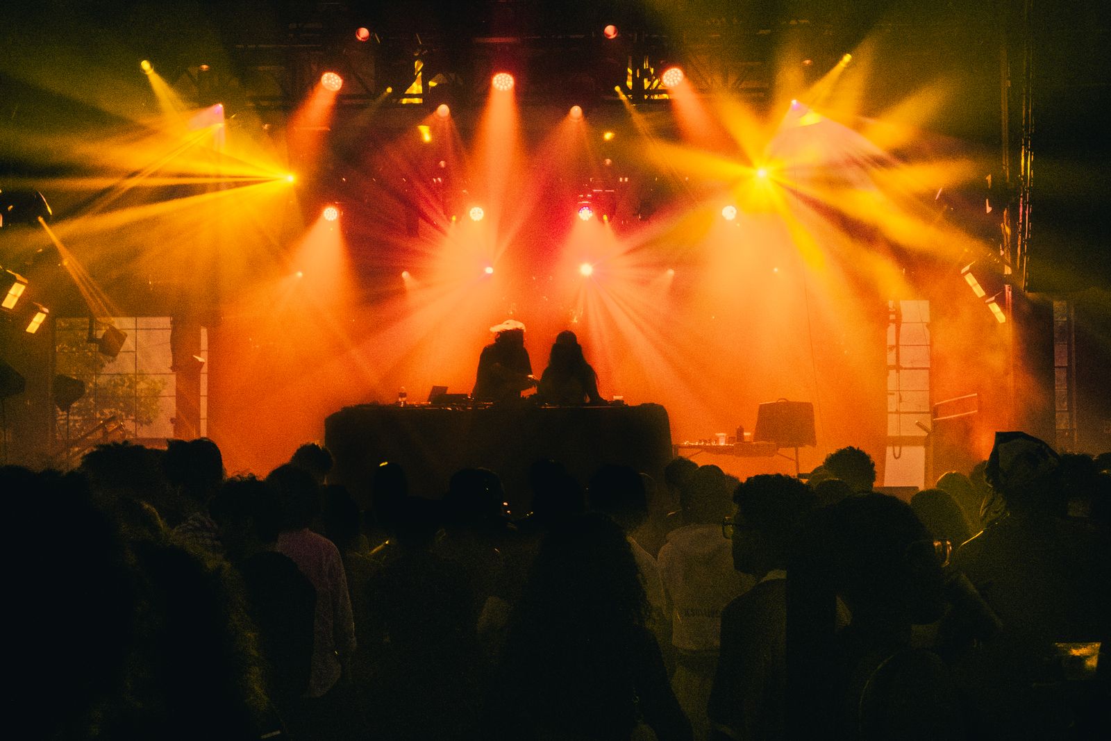 Image may contain Lighting Concert Crowd Person Urban Rock Concert Electronics Speaker Adult and Accessories