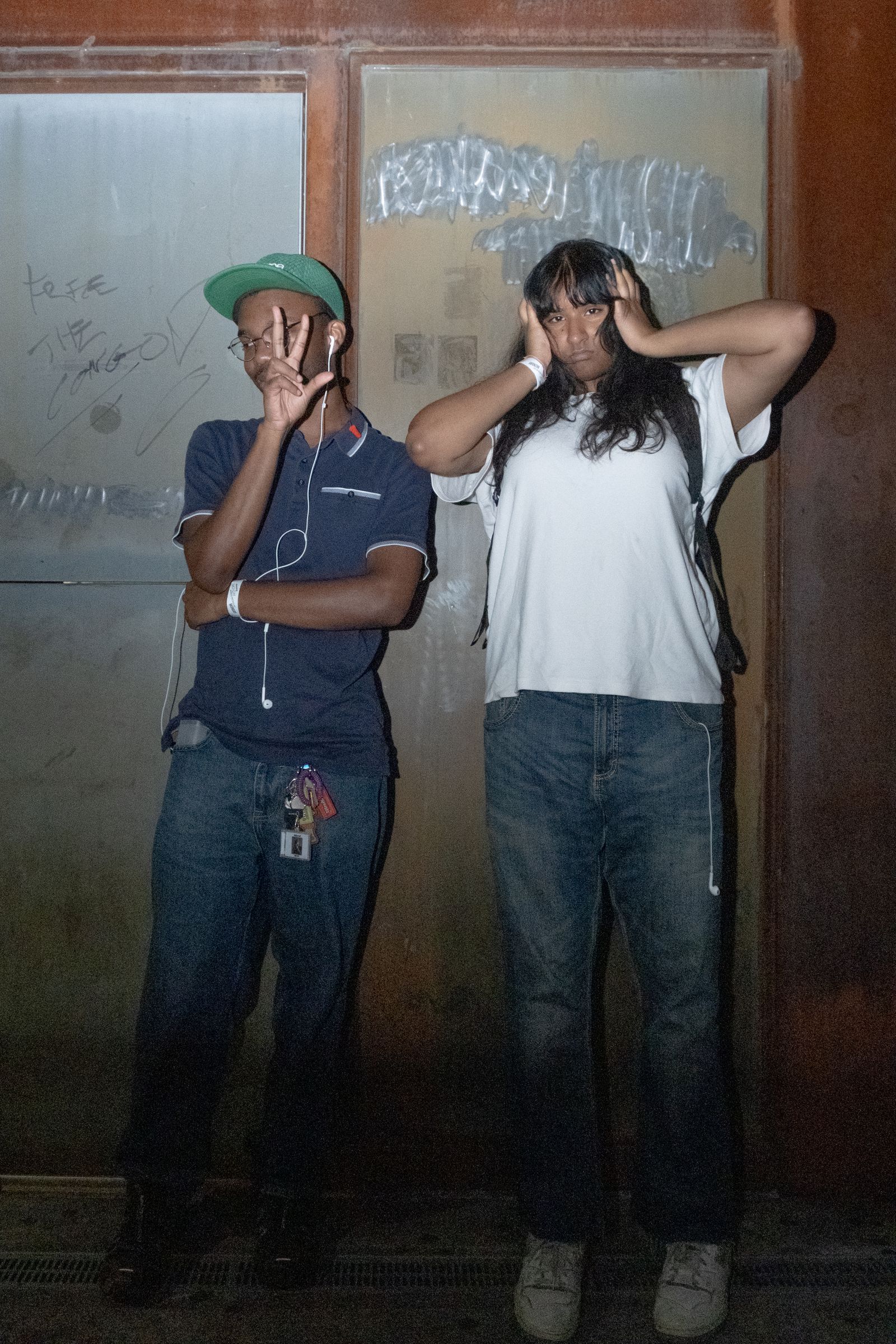 Image may contain Clothing Pants Jeans Face Head Person Photography Portrait Hardhat Helmet TShirt and Footwear