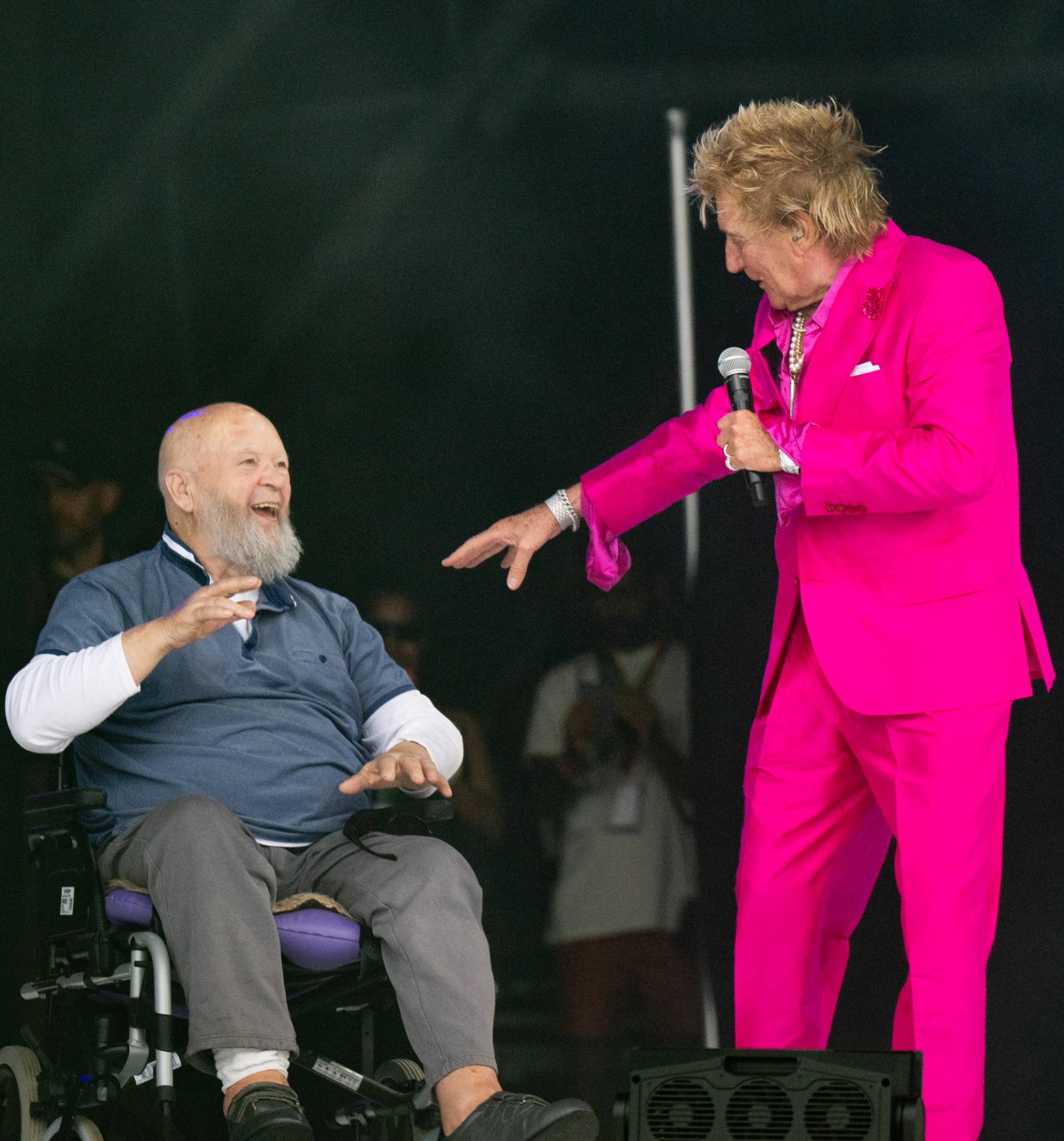 Rod Stewart greets Michael Eavis on the Pyramid stage during day five of the Glastonbury Festival 2025. (Photo by Samir Hussein/WireImage)